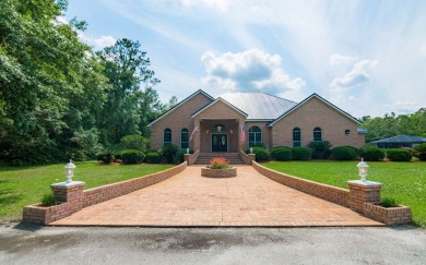 Welcome to your own private estate -- a true masterpiece of on Quail Heights Golf and Country Club in Florida - for sale on GolfHomes.com, golf home, golf lot