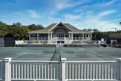 Charming Spinnaker Beach House overlooking the stunning views of on The Seabrook Island Club in South Carolina - for sale on GolfHomes.com, golf home, golf lot