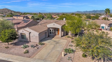 Experience the pinnacle of desert living in this impeccably on Estrella Mountain Ranch Golf Course in Arizona - for sale on GolfHomes.com, golf home, golf lot