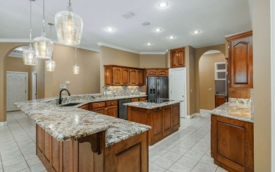 Welcome to your own private estate -- a true masterpiece of on Quail Heights Golf and Country Club in Florida - for sale on GolfHomes.com, golf home, golf lot