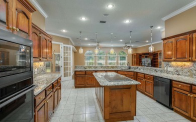 Welcome to your own private estate -- a true masterpiece of on Quail Heights Golf and Country Club in Florida - for sale on GolfHomes.com, golf home, golf lot