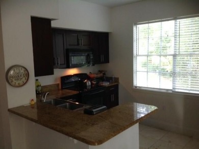 Nice 2BR/2Bath in the heart of Metrowest.  Kitchen features on MetroWest Golf Club in Florida - for sale on GolfHomes.com, golf home, golf lot