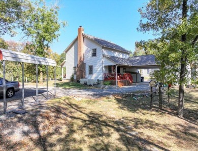 Step inside and you'll immediately notice the thoughtfully on Diamondhead Golf and Country Club in Arkansas - for sale on GolfHomes.com, golf home, golf lot