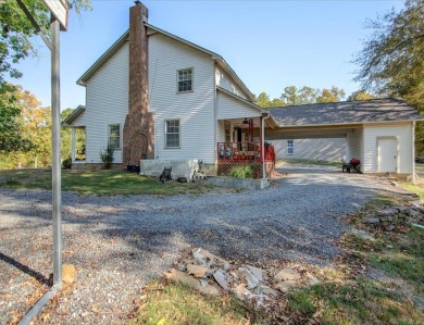 Step inside and you'll immediately notice the thoughtfully on Diamondhead Golf and Country Club in Arkansas - for sale on GolfHomes.com, golf home, golf lot