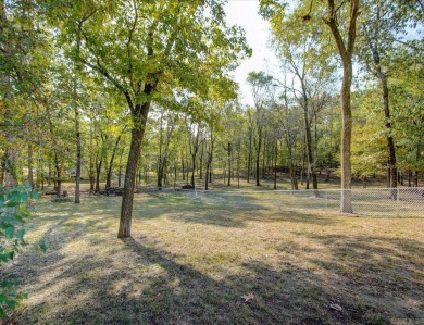 Step inside and you'll immediately notice the thoughtfully on Diamondhead Golf and Country Club in Arkansas - for sale on GolfHomes.com, golf home, golf lot