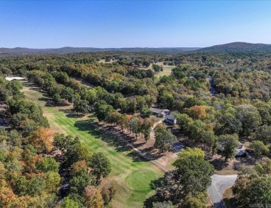 Step inside and you'll immediately notice the thoughtfully on Diamondhead Golf and Country Club in Arkansas - for sale on GolfHomes.com, golf home, golf lot