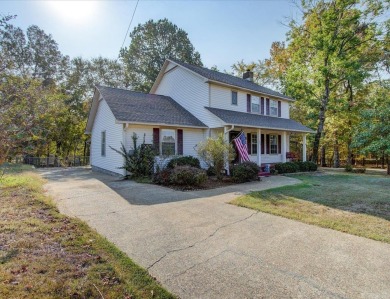 Step inside and you'll immediately notice the thoughtfully on Diamondhead Golf and Country Club in Arkansas - for sale on GolfHomes.com, golf home, golf lot