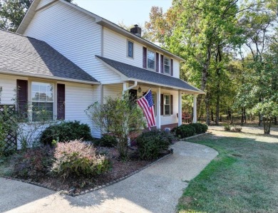 Step inside and you'll immediately notice the thoughtfully on Diamondhead Golf and Country Club in Arkansas - for sale on GolfHomes.com, golf home, golf lot