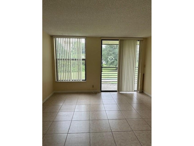 SPACIOUS 2/2 UNIT READY TO MOVE IN. UNIQUE & SCENIC VIEW OF THE on Colony West Country Club in Florida - for sale on GolfHomes.com, golf home, golf lot
