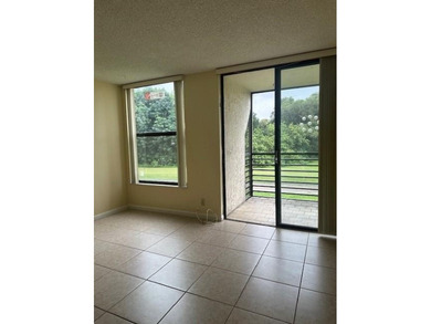 SPACIOUS 2/2 UNIT READY TO MOVE IN. UNIQUE & SCENIC VIEW OF THE on Colony West Country Club in Florida - for sale on GolfHomes.com, golf home, golf lot