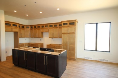 This new construction condo overlooks Oak Ridge Golf Course & is on Oak Ridge Golf Course in Wisconsin - for sale on GolfHomes.com, golf home, golf lot