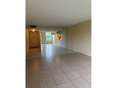 SPACIOUS 2/2 UNIT READY TO MOVE IN. UNIQUE & SCENIC VIEW OF THE on Colony West Country Club in Florida - for sale on GolfHomes.com, golf home, golf lot