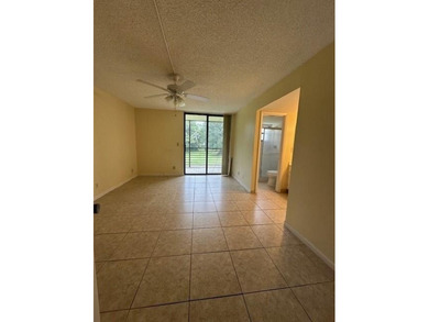 SPACIOUS 2/2 UNIT READY TO MOVE IN. UNIQUE & SCENIC VIEW OF THE on Colony West Country Club in Florida - for sale on GolfHomes.com, golf home, golf lot