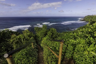 Nestled in the heart of Princeville, Hanalei Bay Villa #8 offers on Makai Golf Club At Princeville in Hawaii - for sale on GolfHomes.com, golf home, golf lot