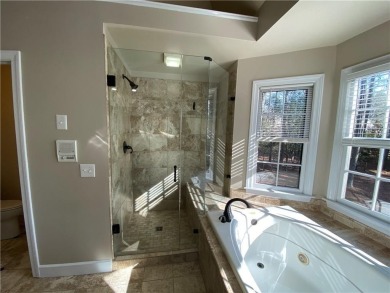 Enjoy the lifestyle provided by the exclusive North Fulton Lake on The Golf Club of Georgia in Georgia - for sale on GolfHomes.com, golf home, golf lot