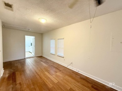 NEW fortified roof! ALL HARD SURFACE FLOORS. NO CARPET. Fully on Lake Forest Yacht and Country Club in Alabama - for sale on GolfHomes.com, golf home, golf lot
