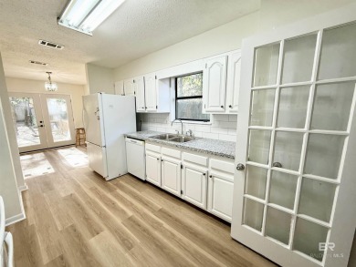 NEW fortified roof! ALL HARD SURFACE FLOORS. NO CARPET. Fully on Lake Forest Yacht and Country Club in Alabama - for sale on GolfHomes.com, golf home, golf lot