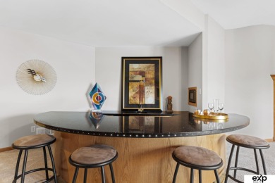 Luxury meets comfort in this stunning custom brick ranch backing on Tiburon Golf Club in Nebraska - for sale on GolfHomes.com, golf home, golf lot