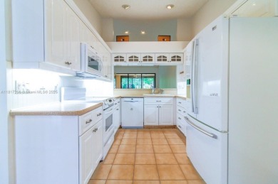 Enjoy resort-style living in this spacious 3-bed, 2.5-bath villa on Boca Delray Golf and Country Club in Florida - for sale on GolfHomes.com, golf home, golf lot