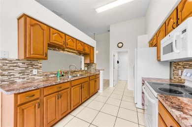 IN TIMBER GREENS A 55+ GATED GOLF COMMUNITY....LOCATION! on Timber Greens Country Club in Florida - for sale on GolfHomes.com, golf home, golf lot