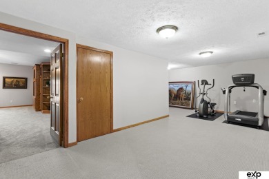 Luxury meets comfort in this stunning custom brick ranch backing on Tiburon Golf Club in Nebraska - for sale on GolfHomes.com, golf home, golf lot