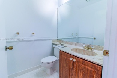 Enjoy resort-style living in this spacious 3-bed, 2.5-bath villa on Boca Delray Golf and Country Club in Florida - for sale on GolfHomes.com, golf home, golf lot