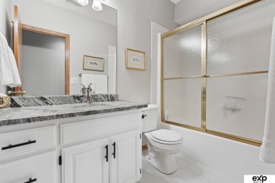 Luxury meets comfort in this stunning custom brick ranch backing on Tiburon Golf Club in Nebraska - for sale on GolfHomes.com, golf home, golf lot