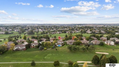 Luxury meets comfort in this stunning custom brick ranch backing on Tiburon Golf Club in Nebraska - for sale on GolfHomes.com, golf home, golf lot