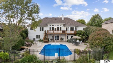 Luxury meets comfort in this stunning custom brick ranch backing on Tiburon Golf Club in Nebraska - for sale on GolfHomes.com, golf home, golf lot
