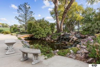 Luxury meets comfort in this stunning custom brick ranch backing on Tiburon Golf Club in Nebraska - for sale on GolfHomes.com, golf home, golf lot