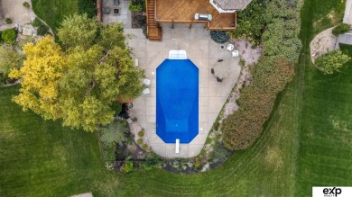Luxury meets comfort in this stunning custom brick ranch backing on Tiburon Golf Club in Nebraska - for sale on GolfHomes.com, golf home, golf lot