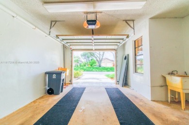 Enjoy resort-style living in this spacious 3-bed, 2.5-bath villa on Boca Delray Golf and Country Club in Florida - for sale on GolfHomes.com, golf home, golf lot