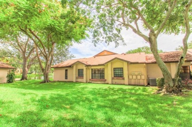 Enjoy resort-style living in this spacious 3-bed, 2.5-bath villa on Boca Delray Golf and Country Club in Florida - for sale on GolfHomes.com, golf home, golf lot