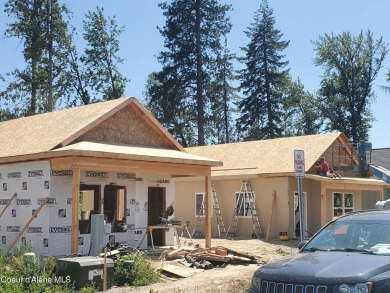 Charming 2-bedroom, 2-bath cottage nestled in a peaceful on Sandpoint Elks Golf Course in Idaho - for sale on GolfHomes.com, golf home, golf lot