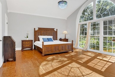 This traditional farmhouse blends Old Florida charm with on Isleworth Golf and Country Club in Florida - for sale on GolfHomes.com, golf home, golf lot