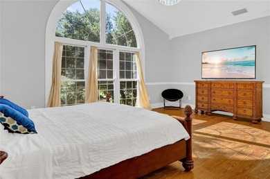 This traditional farmhouse blends Old Florida charm with on Isleworth Golf and Country Club in Florida - for sale on GolfHomes.com, golf home, golf lot