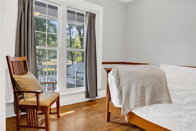 This traditional farmhouse blends Old Florida charm with on Isleworth Golf and Country Club in Florida - for sale on GolfHomes.com, golf home, golf lot