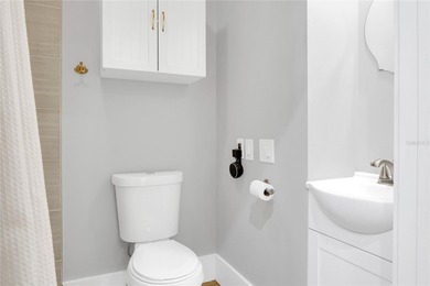 This traditional farmhouse blends Old Florida charm with on Isleworth Golf and Country Club in Florida - for sale on GolfHomes.com, golf home, golf lot