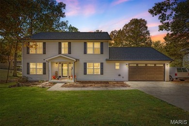 Beautifully updated 2,600 +/- Sq Ft 4 Bedroom, 3 Bathroom home on Raintree Country Club in Missouri - for sale on GolfHomes.com, golf home, golf lot