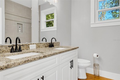 This traditional farmhouse blends Old Florida charm with on Isleworth Golf and Country Club in Florida - for sale on GolfHomes.com, golf home, golf lot