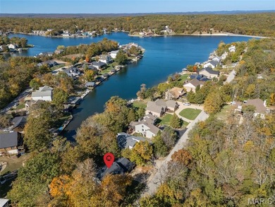 Beautifully updated 2,600 +/- Sq Ft 4 Bedroom, 3 Bathroom home on Raintree Country Club in Missouri - for sale on GolfHomes.com, golf home, golf lot