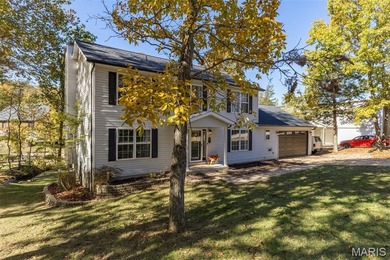 Beautifully updated 2,600 +/- Sq Ft 4 Bedroom, 3 Bathroom home on Raintree Country Club in Missouri - for sale on GolfHomes.com, golf home, golf lot