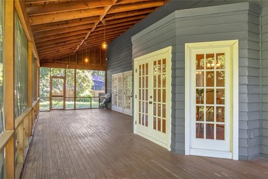 This traditional farmhouse blends Old Florida charm with on Isleworth Golf and Country Club in Florida - for sale on GolfHomes.com, golf home, golf lot