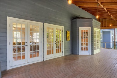 This traditional farmhouse blends Old Florida charm with on Isleworth Golf and Country Club in Florida - for sale on GolfHomes.com, golf home, golf lot