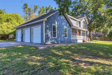 This traditional farmhouse blends Old Florida charm with on Isleworth Golf and Country Club in Florida - for sale on GolfHomes.com, golf home, golf lot