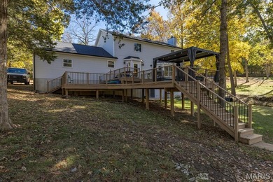 Beautifully updated 2,600 +/- Sq Ft 4 Bedroom, 3 Bathroom home on Raintree Country Club in Missouri - for sale on GolfHomes.com, golf home, golf lot