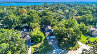 This traditional farmhouse blends Old Florida charm with on Isleworth Golf and Country Club in Florida - for sale on GolfHomes.com, golf home, golf lot