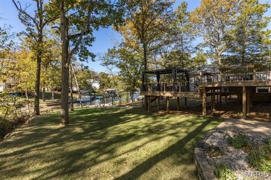 Beautifully updated 2,600 +/- Sq Ft 4 Bedroom, 3 Bathroom home on Raintree Country Club in Missouri - for sale on GolfHomes.com, golf home, golf lot