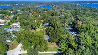 This traditional farmhouse blends Old Florida charm with on Isleworth Golf and Country Club in Florida - for sale on GolfHomes.com, golf home, golf lot