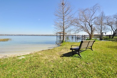This traditional farmhouse blends Old Florida charm with on Isleworth Golf and Country Club in Florida - for sale on GolfHomes.com, golf home, golf lot